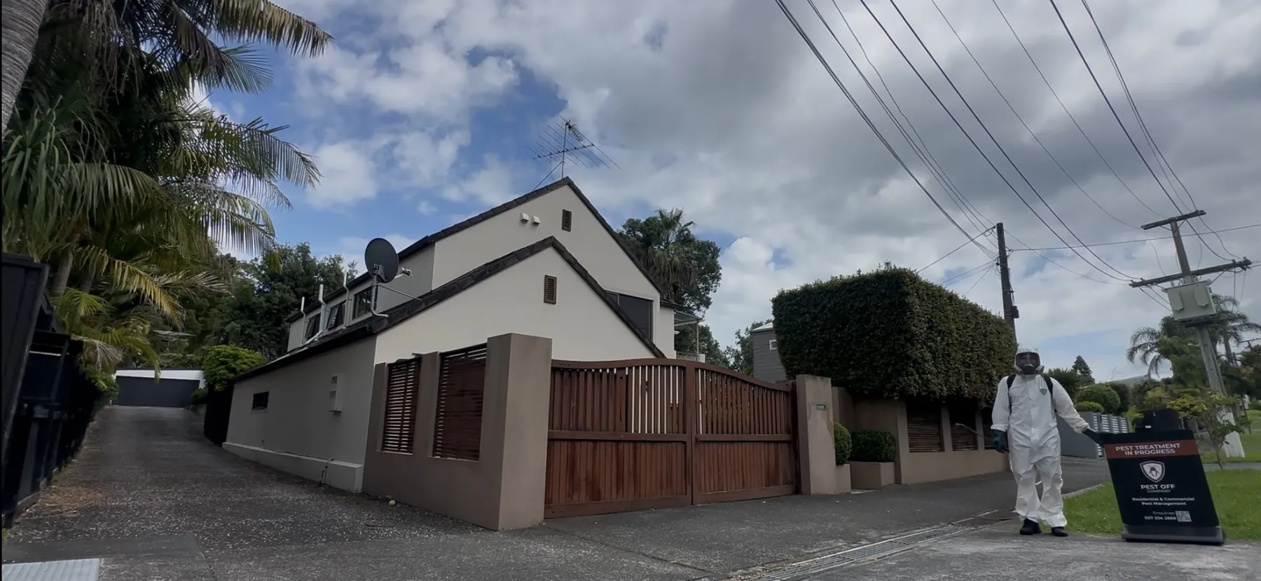 Pest OFF Company carrying out a residential pest treatment in an Auckland neighbourhood